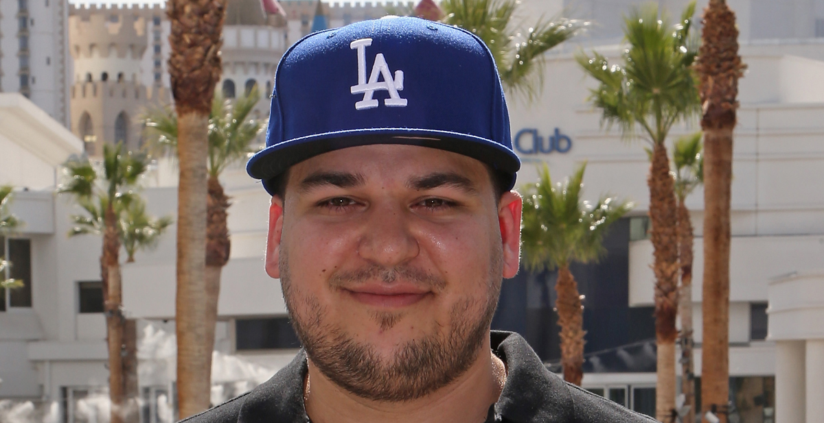 Rob Kardashian Shares Rare Shirtless Selfie in the Pool Rob