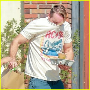 Dax Shepard Covers His Face With His Shirt While Getting Food Delivered