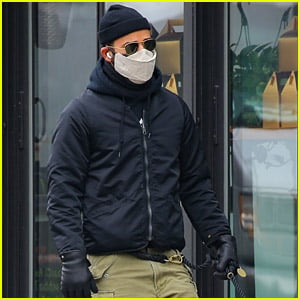 Justin Theroux Rocks Leather Gloves During Walk with His Beloved Dog Kuma
