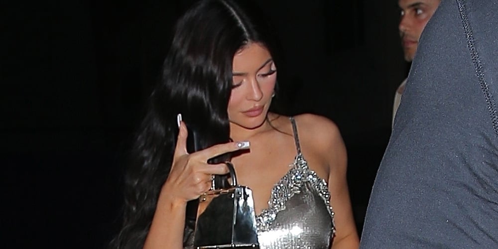 Kylie Jenner Sparkles in Silver While Joining Friends for Dinner in Santa Monica