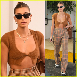 Hailey Bieber Shows Off Her Fit Figure in Crop-Top Sweater & Plaid Pants