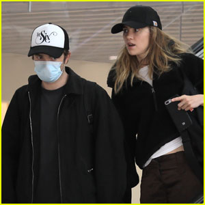 Robert Pattinson & Suki Waterhouse Keep Low Profile While Landing in L.A.