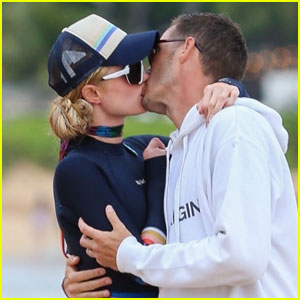 Paris Hilton & Husband Carter Reum Share Sweet Kiss on Vacation in Maui