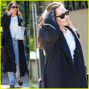 Miley Cyrus Welcomes Fall With Chic Black Trench Coat & Dark Hair During Lunch With a Friend