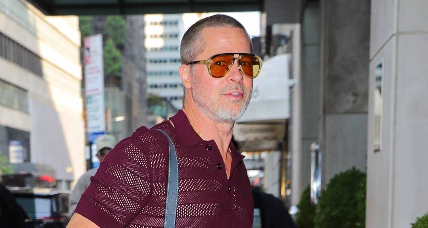 Brad Pitt Wears Sheer Shirt & Neon Red Pants While Arriving in NYC