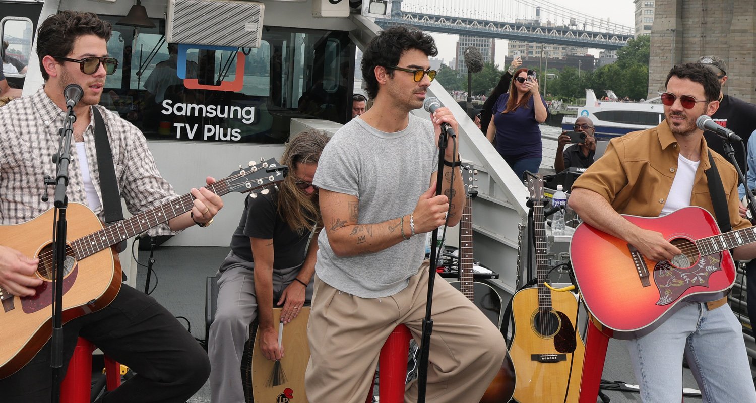 Jonas Brothers Perform Surprise Pop Up Show on NYC Ferry Ahead of ‘Greetings From Your Hometown’ Album Release & Tour Kickoff