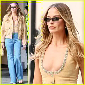 Margot Robbie Wears Low-Cut Top & Flared Jeans for London Press Appearance