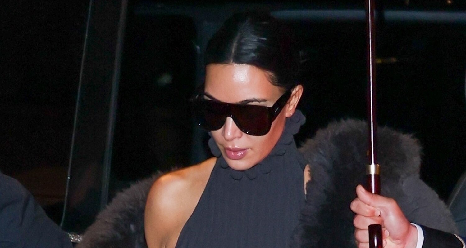 Kim Kardashian Braves Rainy Weather as She Arrives in Paris for Fashion Week