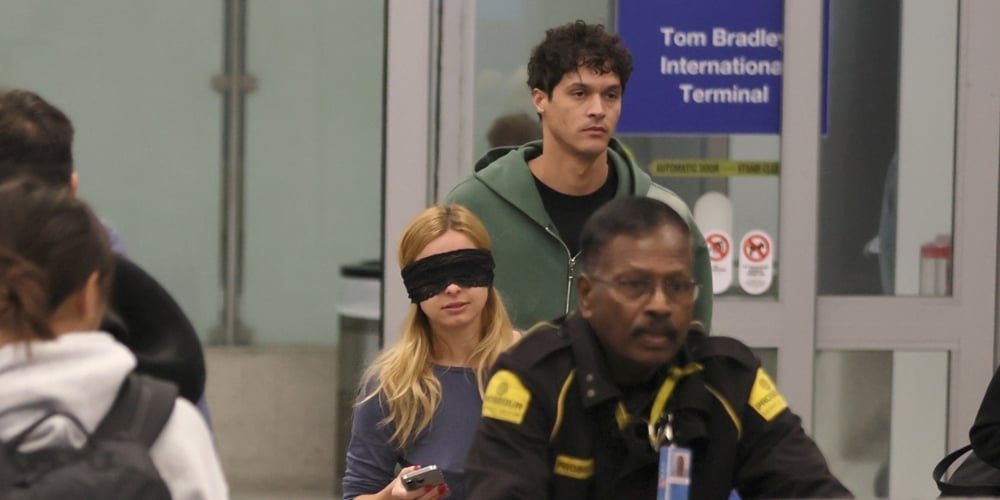 Addison Rae Wears Blindfold at LAX Airport With Basketball Player Addison Owen