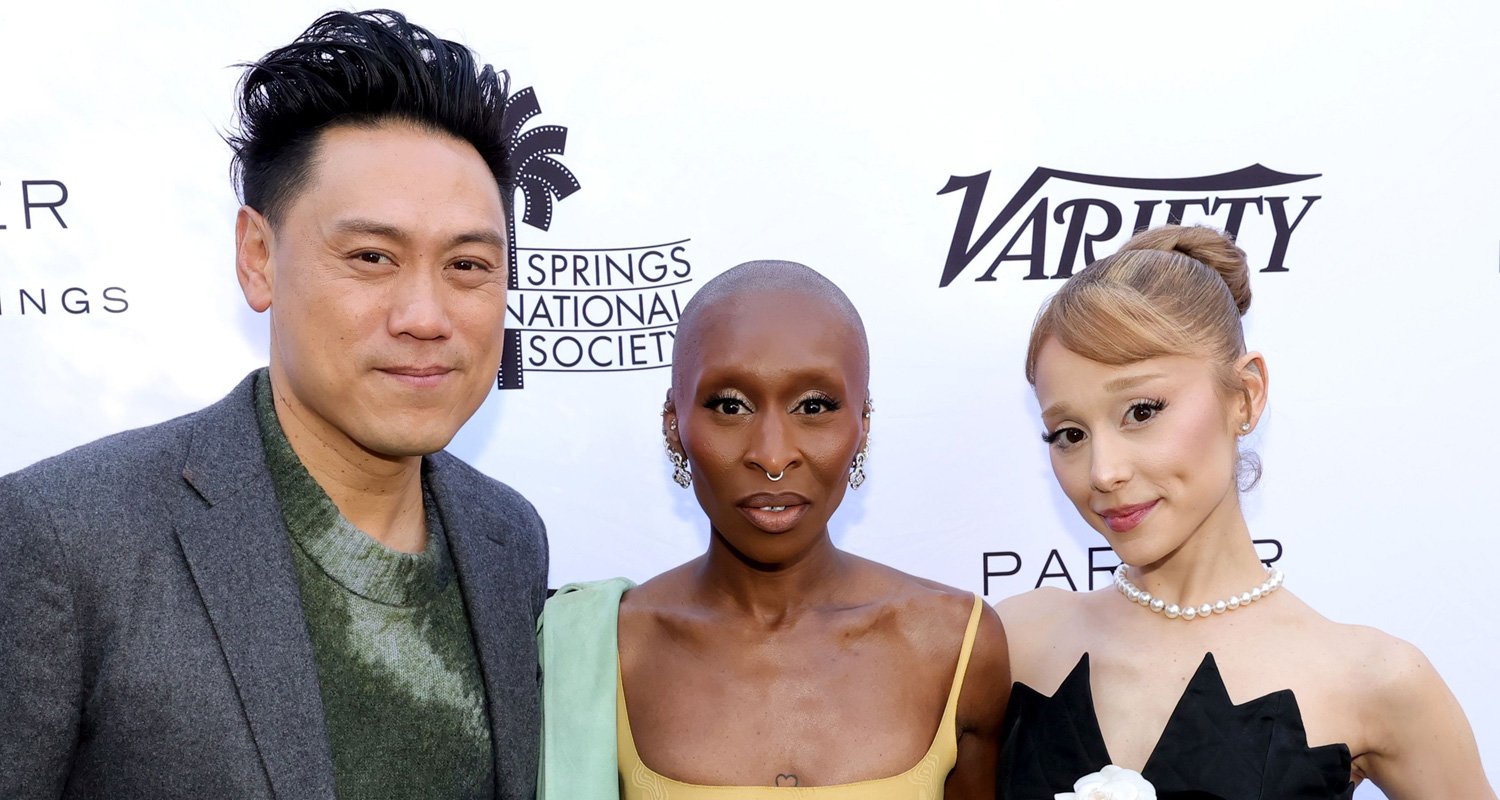 ‘Wicked’ Director Jon M Chu Reacts to Ariana Grande & Cynthia Erivo’s Matching Tattoos