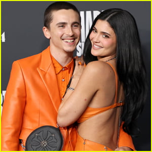  Explaining the Bright Orange Outfits Worn by Timothée Chalamet & Kylie Jenner