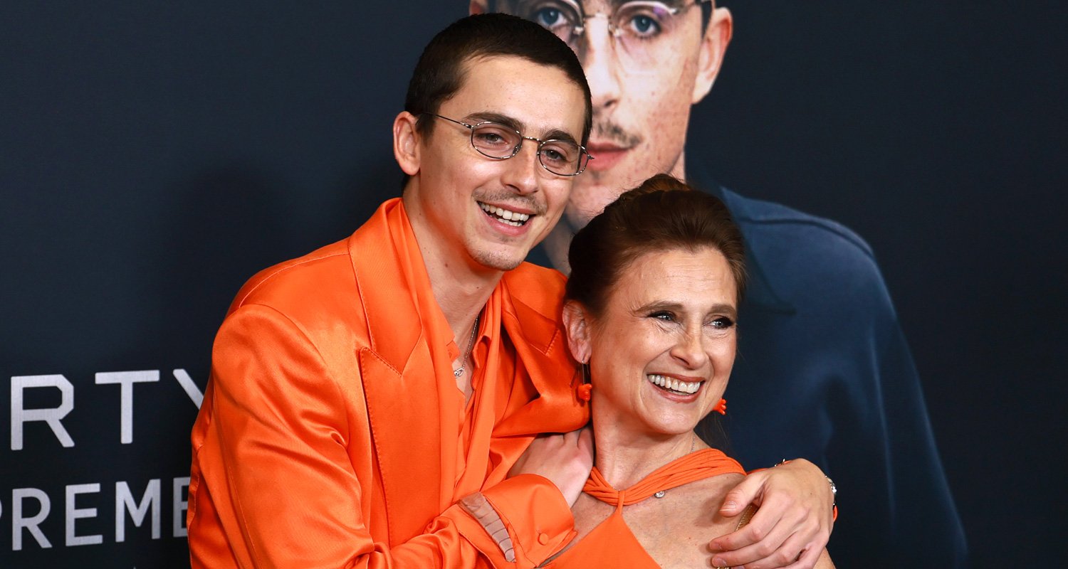 Timothee Chalamet Gets Mom Nicole Flender’s Support at ‘Marty Supreme’ NYC Premiere, Wear Matching Orange Looks