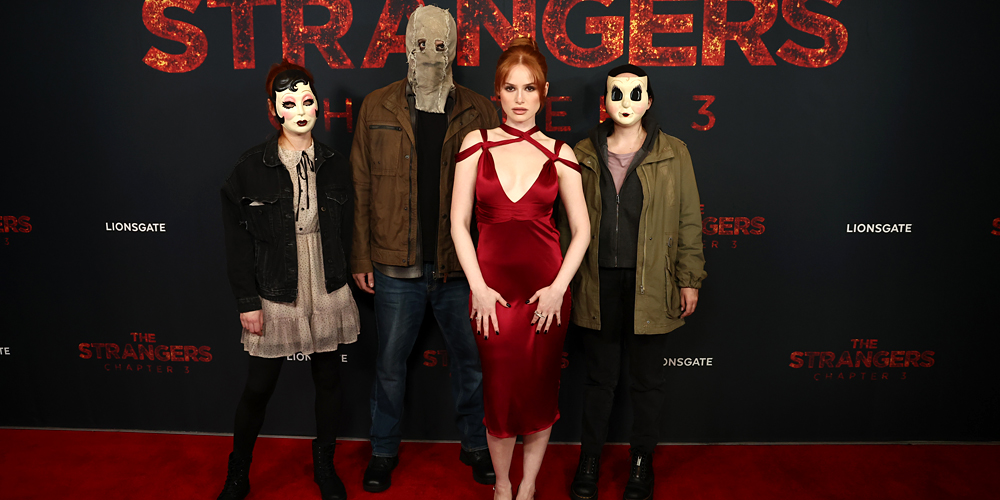 Madelaine Petsch Stuns in Strappy Crimson Dress at 'The Strangers' Trilogy Screening