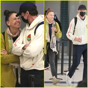 Hugh Jackman & Girlfriend Sutton Foster Share Cute Moment at LAX Airport