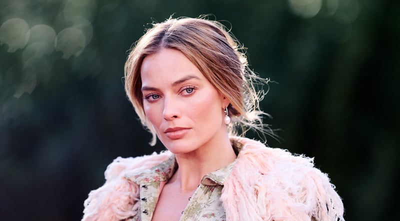 Margot Robbie Says a Male Actor Once Gave Her a Book About Eating Less