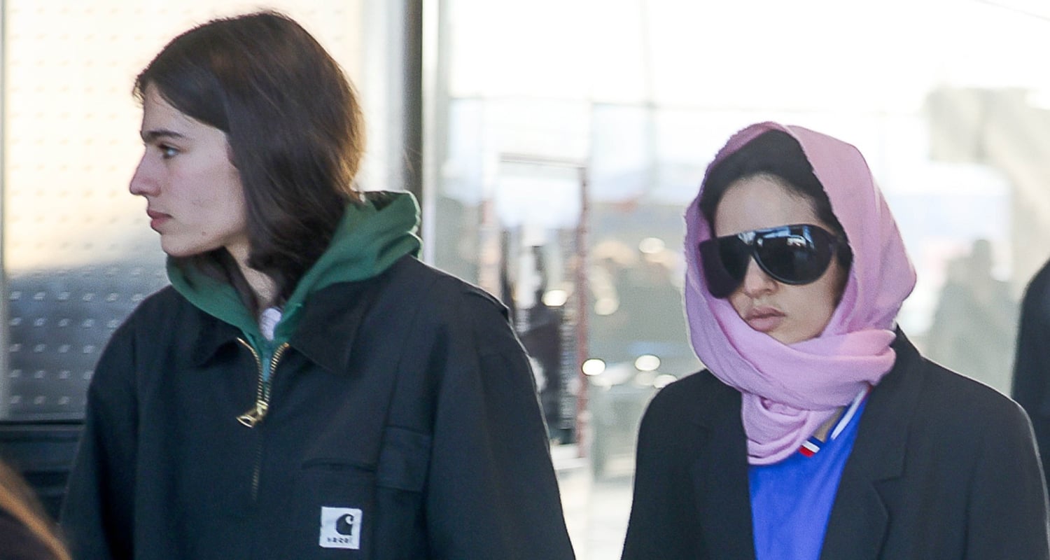 Rosalia Holds Hands with Loli Bahia as They Catch Flight Out of Milan