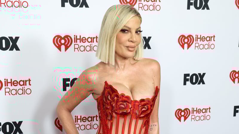 Tori Spelling Wears Revealing Sheer Red Dress on iHeartRadio Music Awards 2026 Carpet