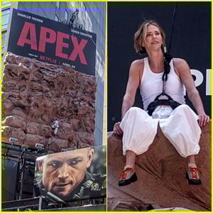 Charlize Theron Climbs Rock Wall Above Times Square to Promote 'APEX' Movie